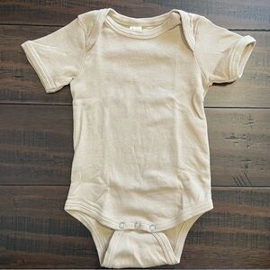 Kate Quinn Beige Skinny Rib Bodysuit Onesie